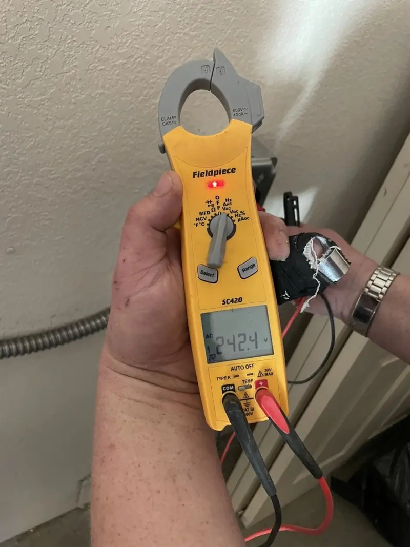 Voltage testing with clamp meter during Generator Installation in Glen Carbon